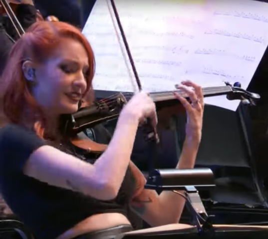 The Video Game Awards Orchestra redhead.png