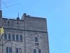 Sniper on the roof aiming at students in Indiana.jpg